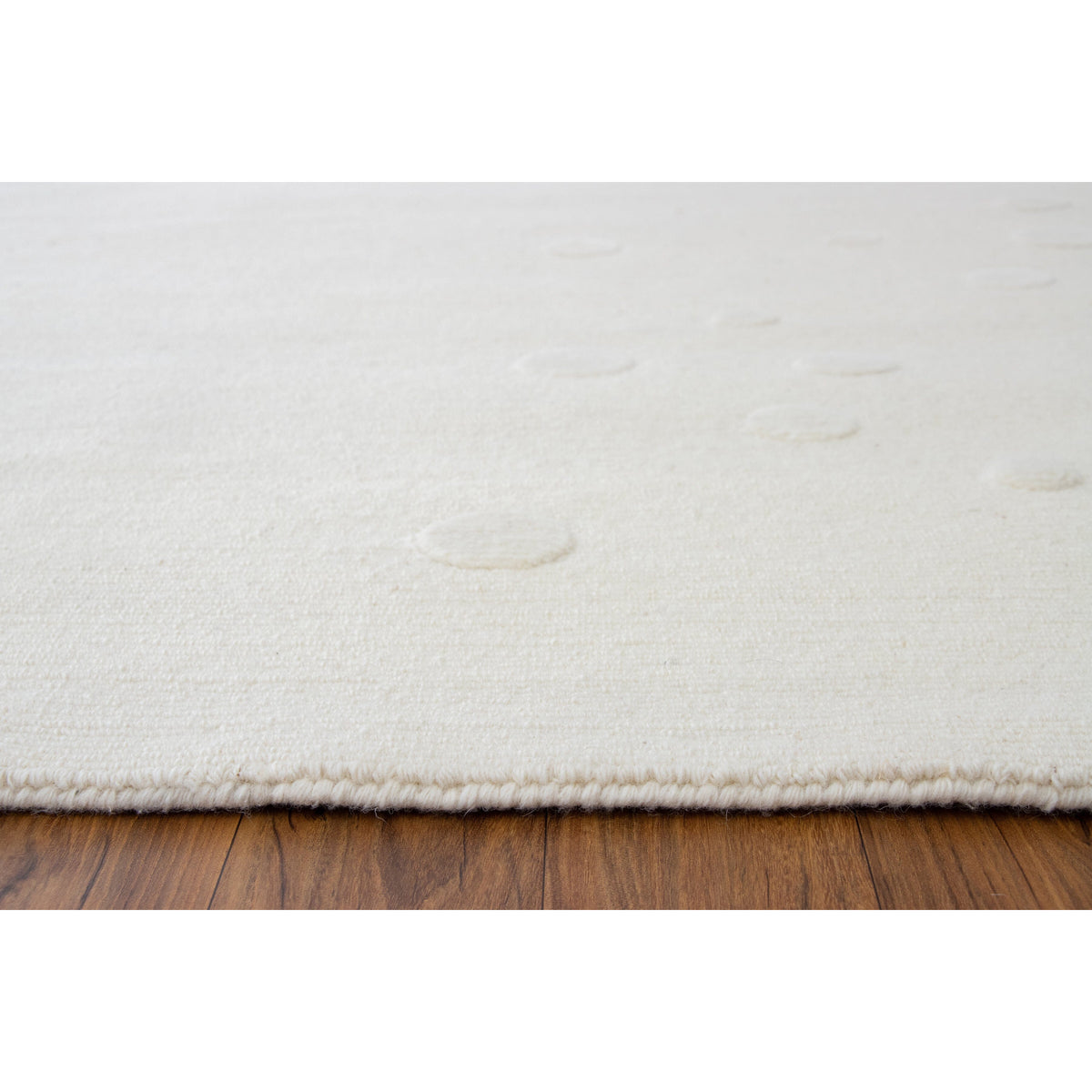 Cozy hand-knotted wool rug, showing the pile height