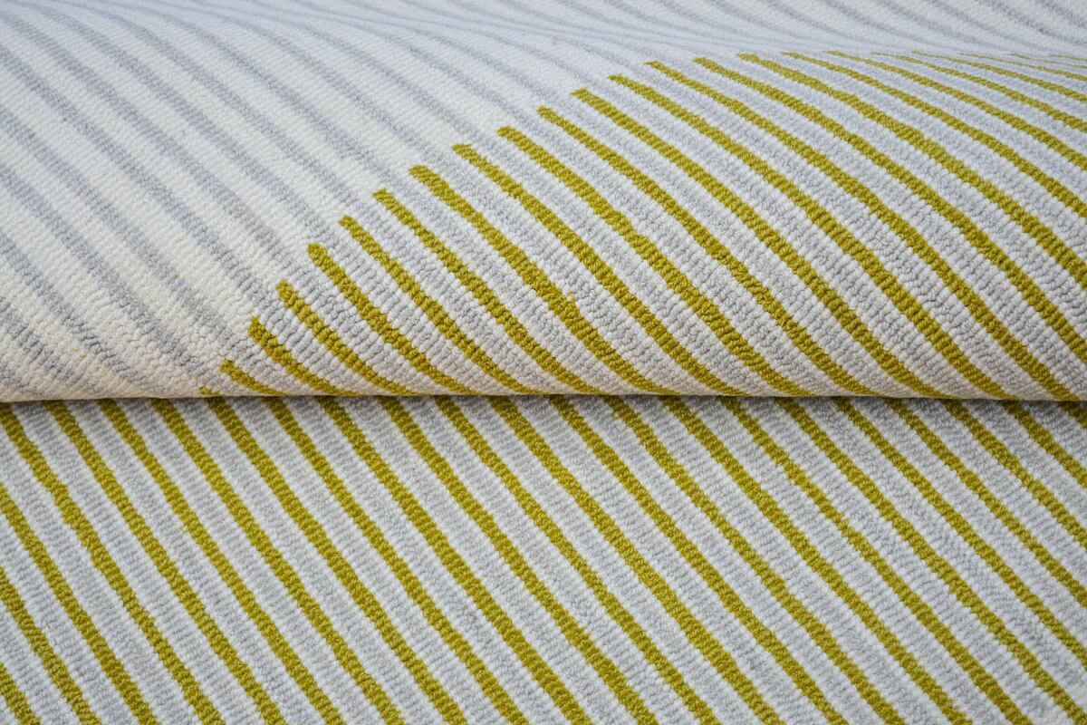 close view of moon hand tufted living area rug