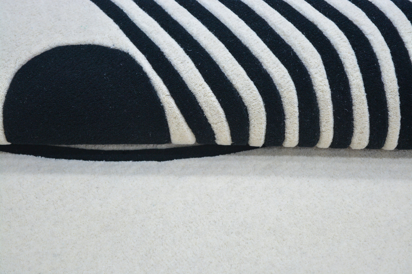 close-up view of IMARA hand tufted wool & silk rug