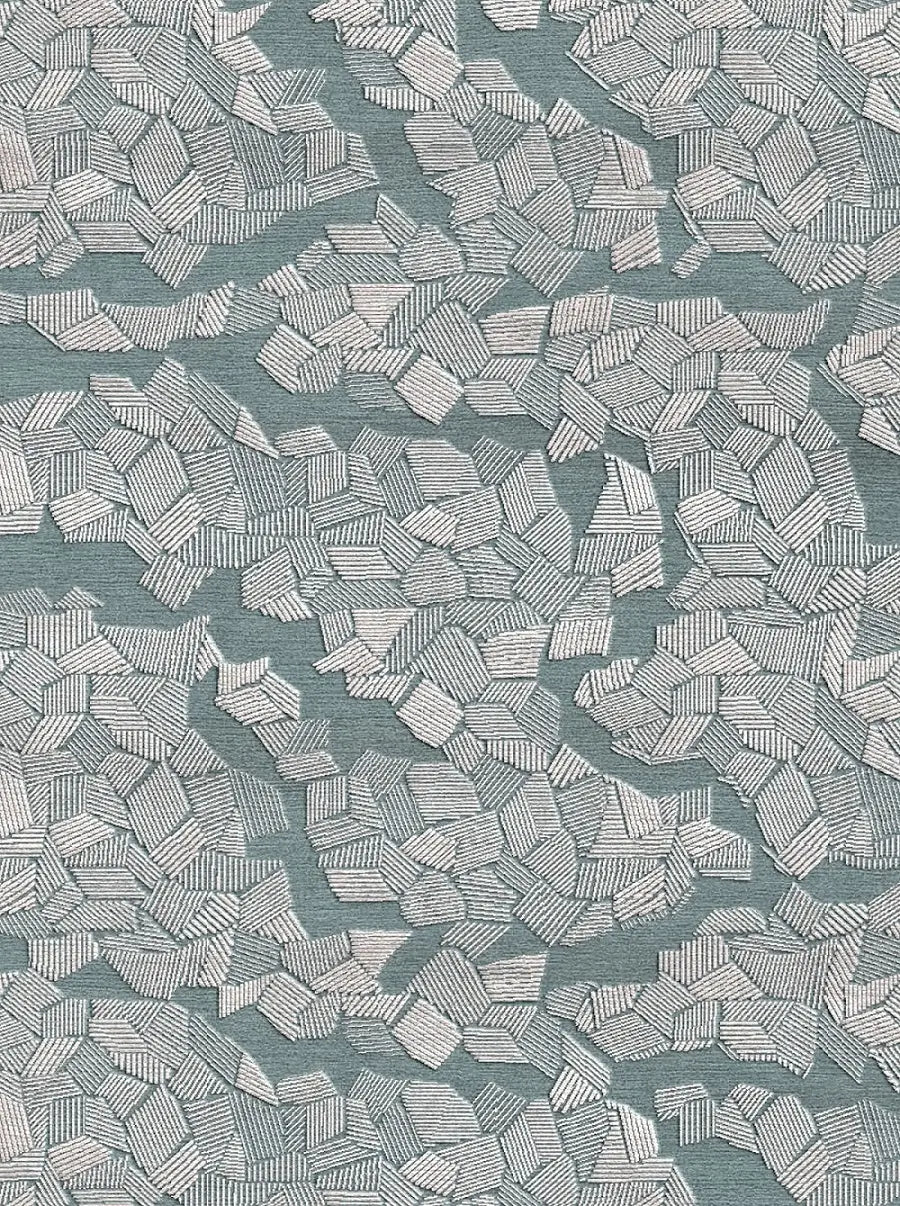 hand tufted textured patterned wool and silk rug with geometric design
