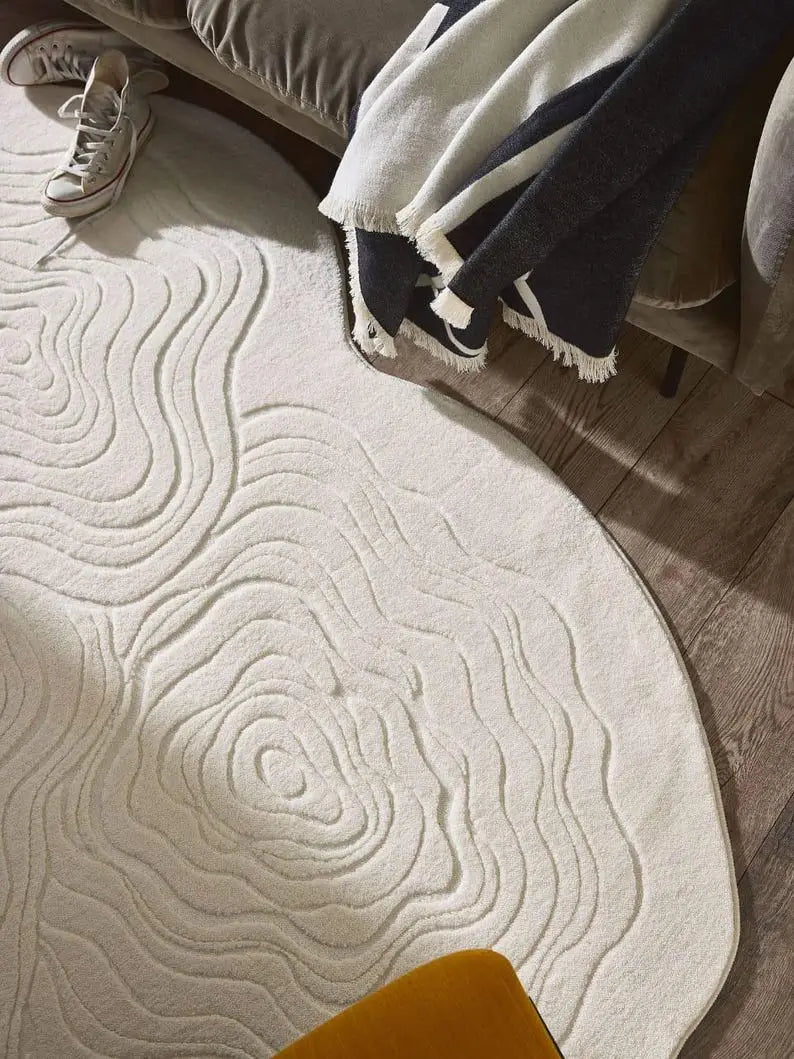 Ivory white shaped wool rug