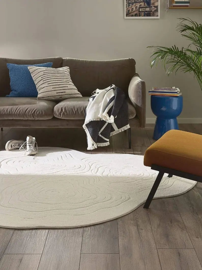 Ivory shaped wool rug in living room