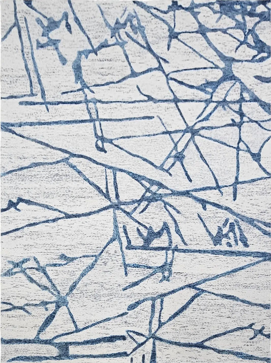 Hand tufted abstract patterned wool rug with blue and gray design