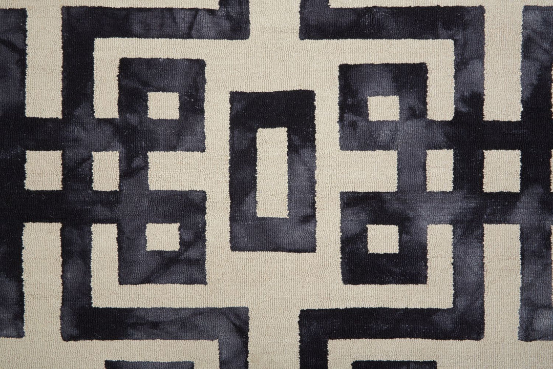 close-up view of Koronge hand tufted wool & silk rug