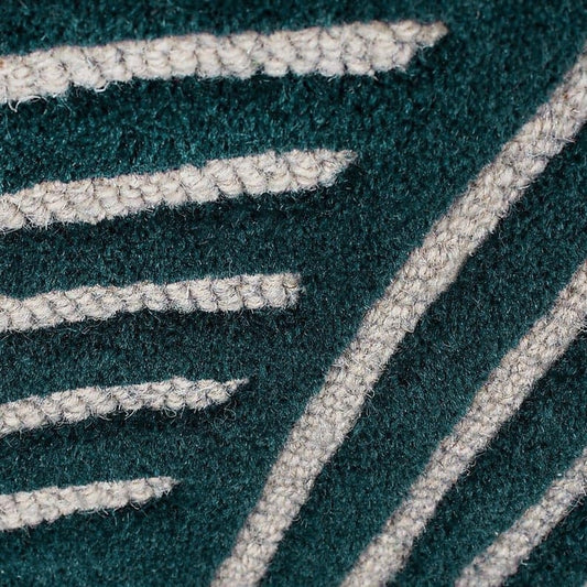 close view of shaped wool rug in black