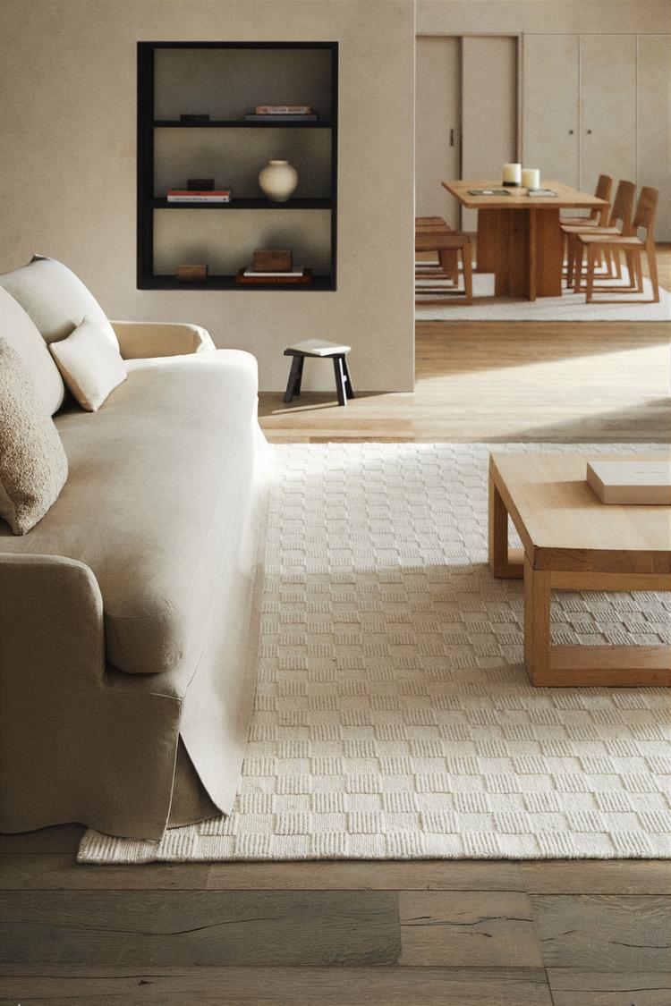 living room with Sea off white handloom rug