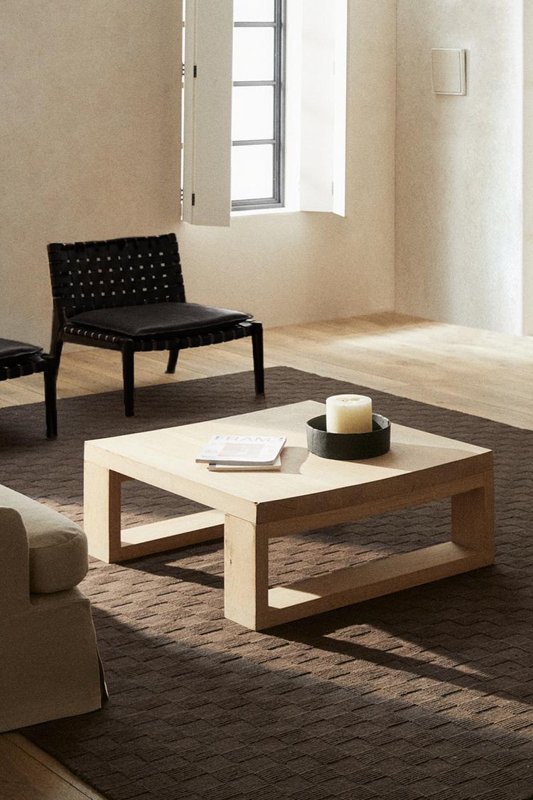 Seval brown handloom textured rug in living room