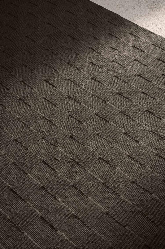 close view of Seval brown handloom textured rug
