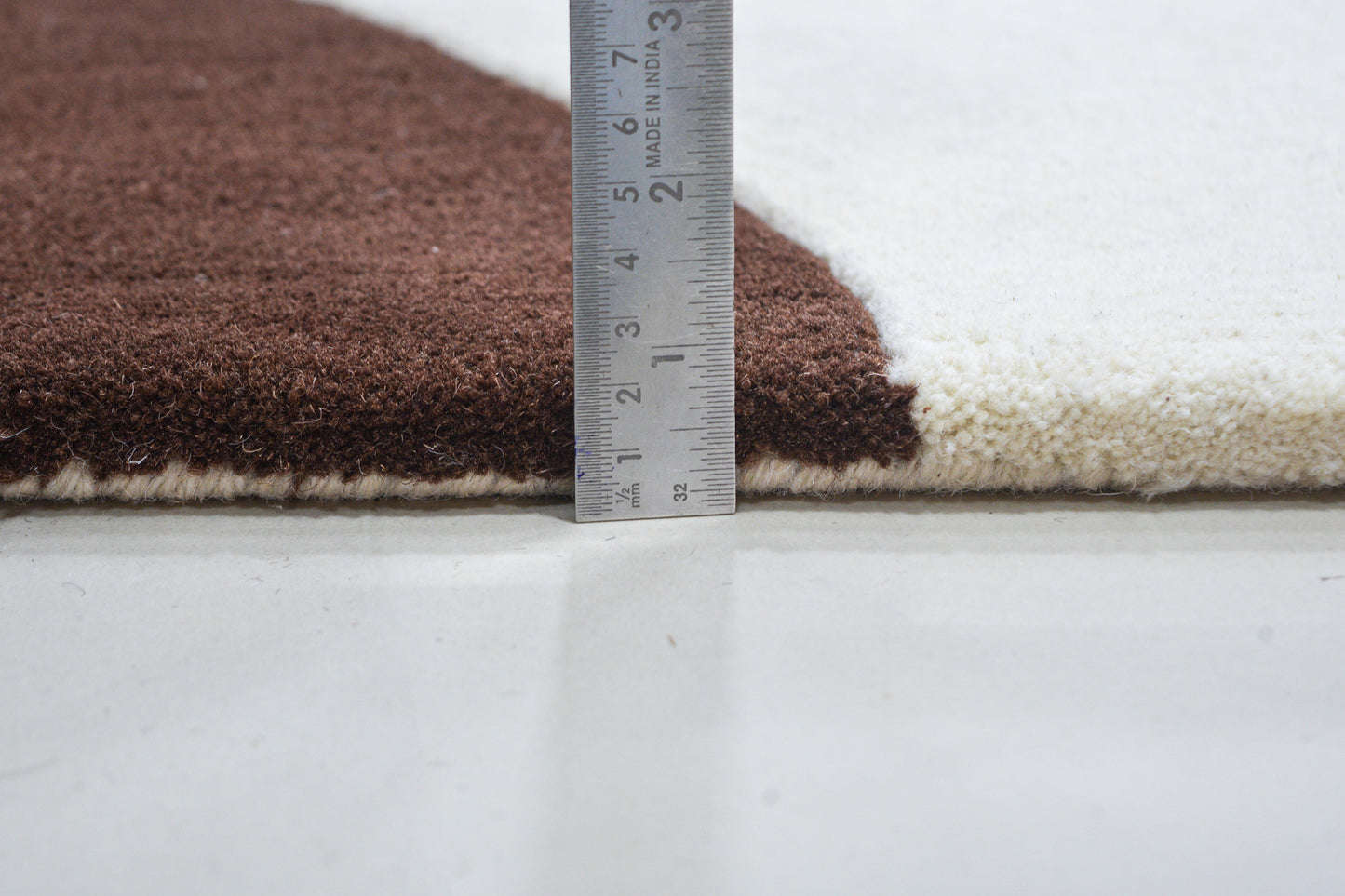 showing pile height of hand tufted modern wool carpet