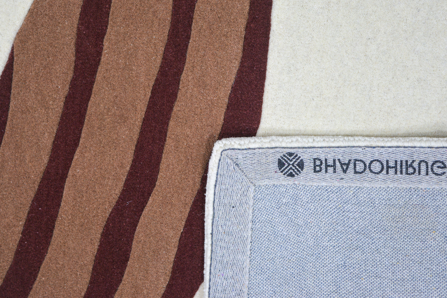 adee hand tufted modern wool carpet, showing back side