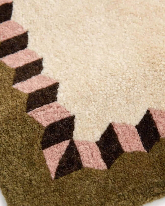 closeup of aurellia hand tufted indian wool area rug