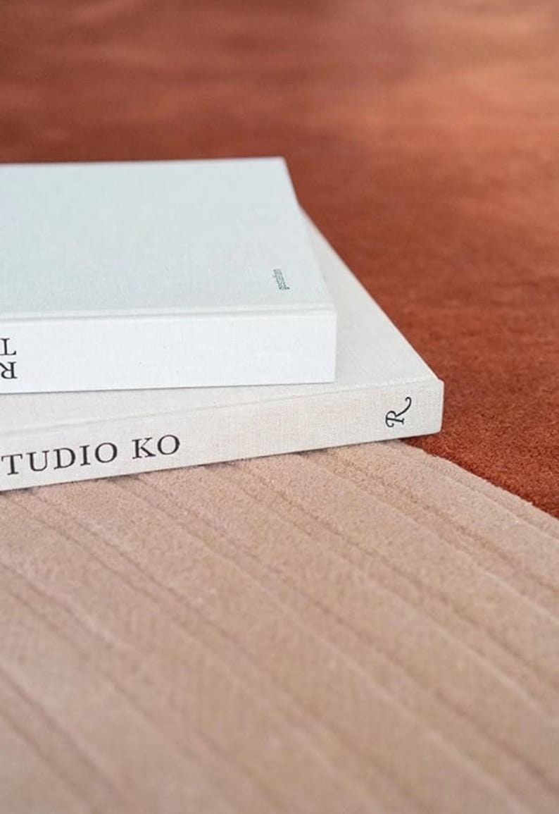 close-up of hand-tufted wool rug, showing texture and details