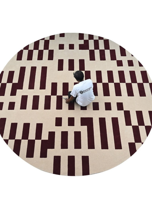 bhadohirug round rug with brown and beige checkered pattern