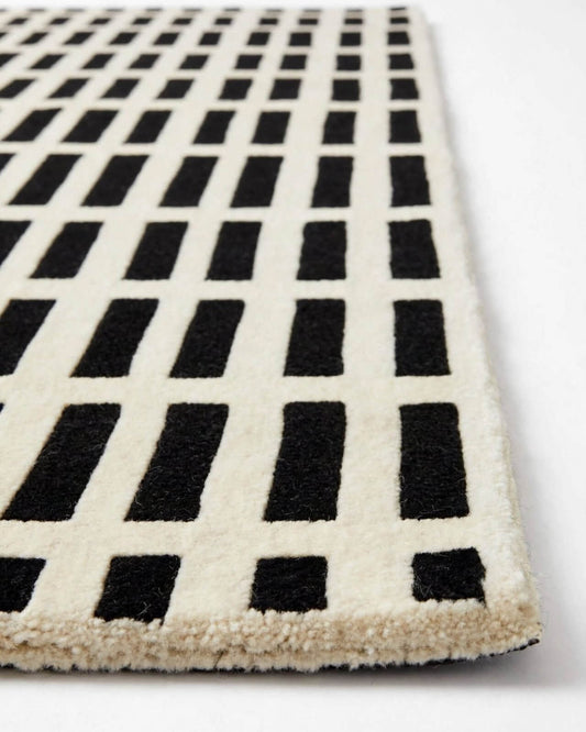 closeup of grid indian wool rug
