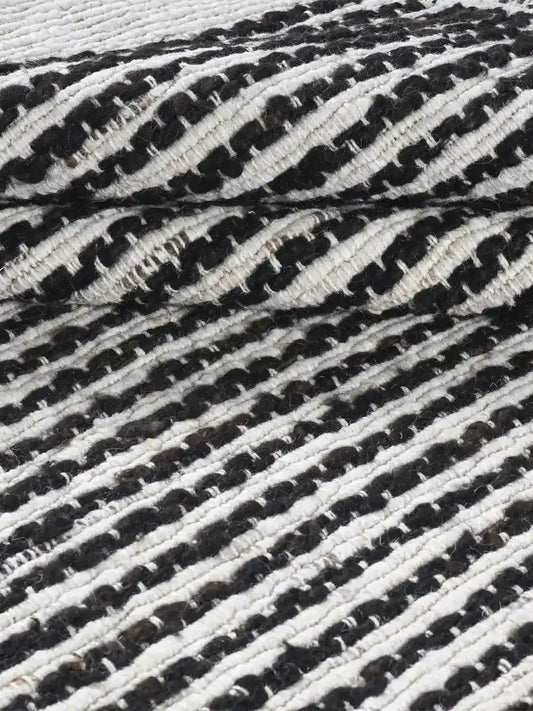 black and white stiped woven jute rug