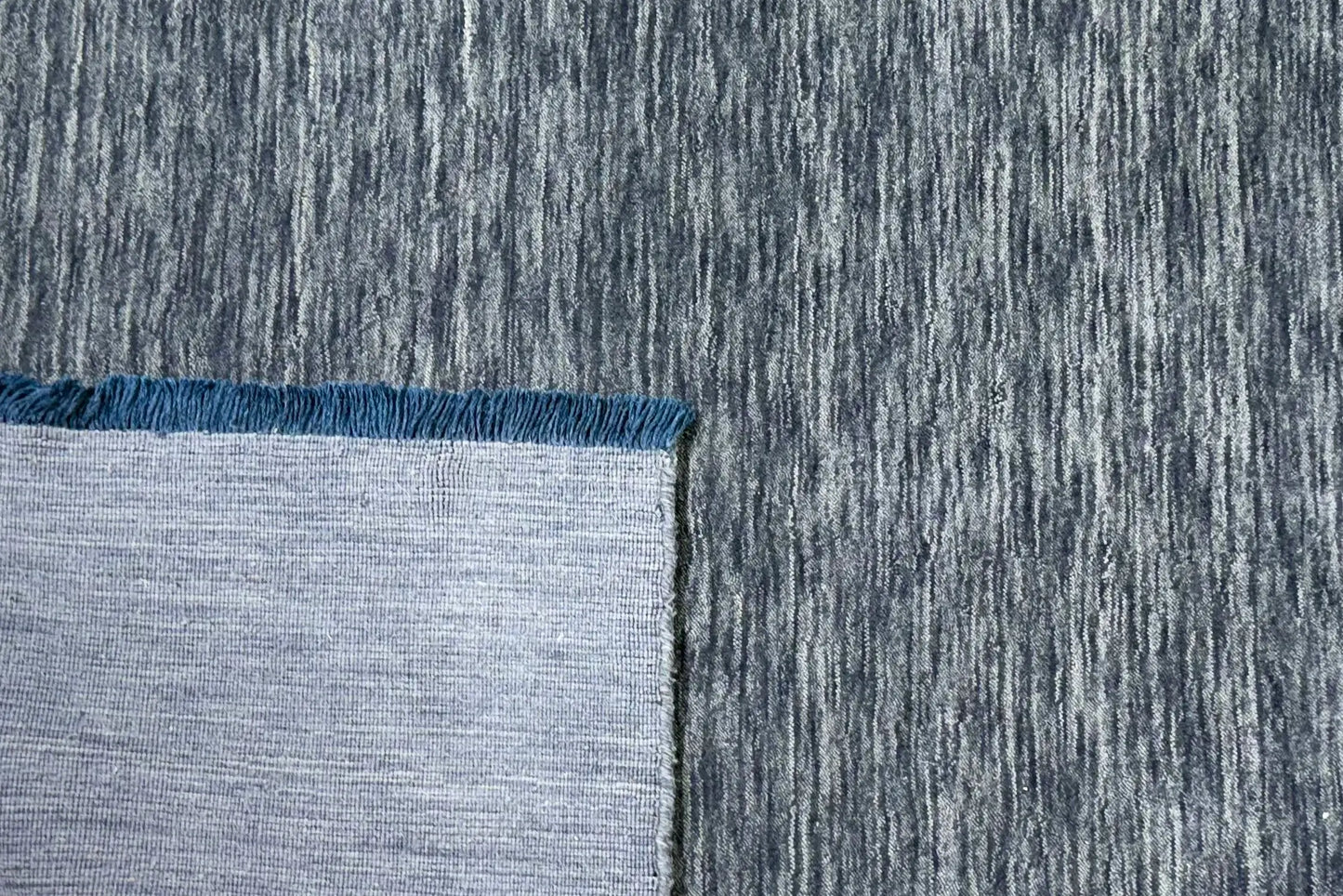 grey handloom area rug back