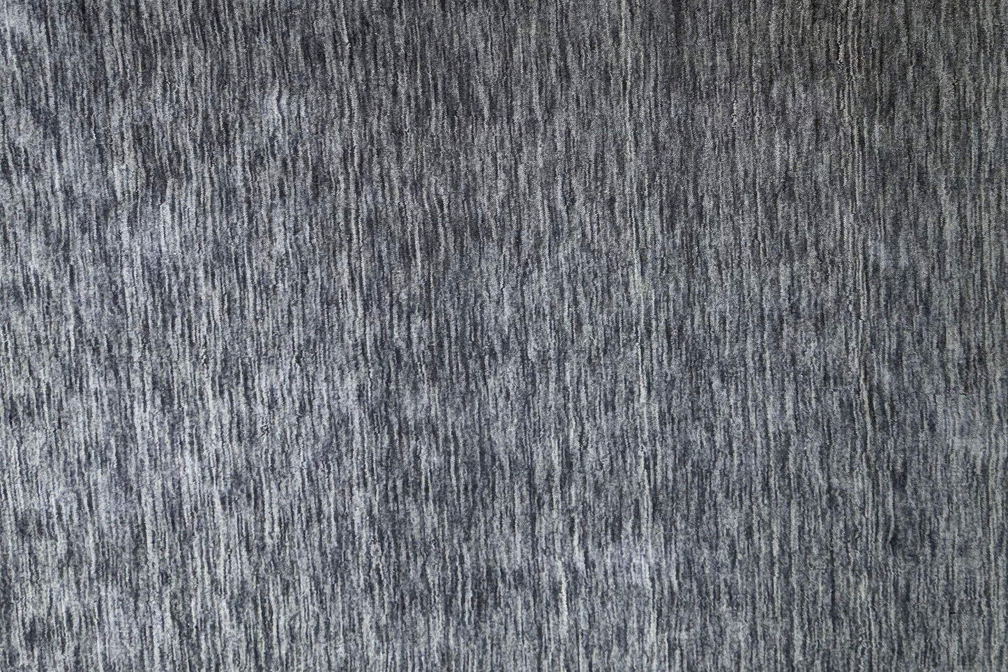 grey handloom area rug close up
