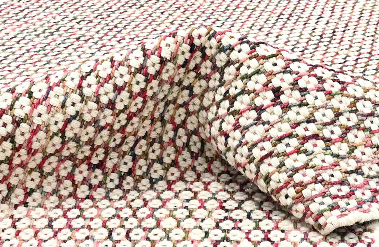 hand woven patterned wool area rug close view