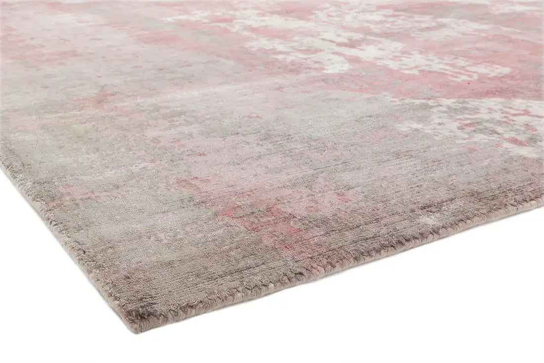 close up of hand woven blush pink viscose rug