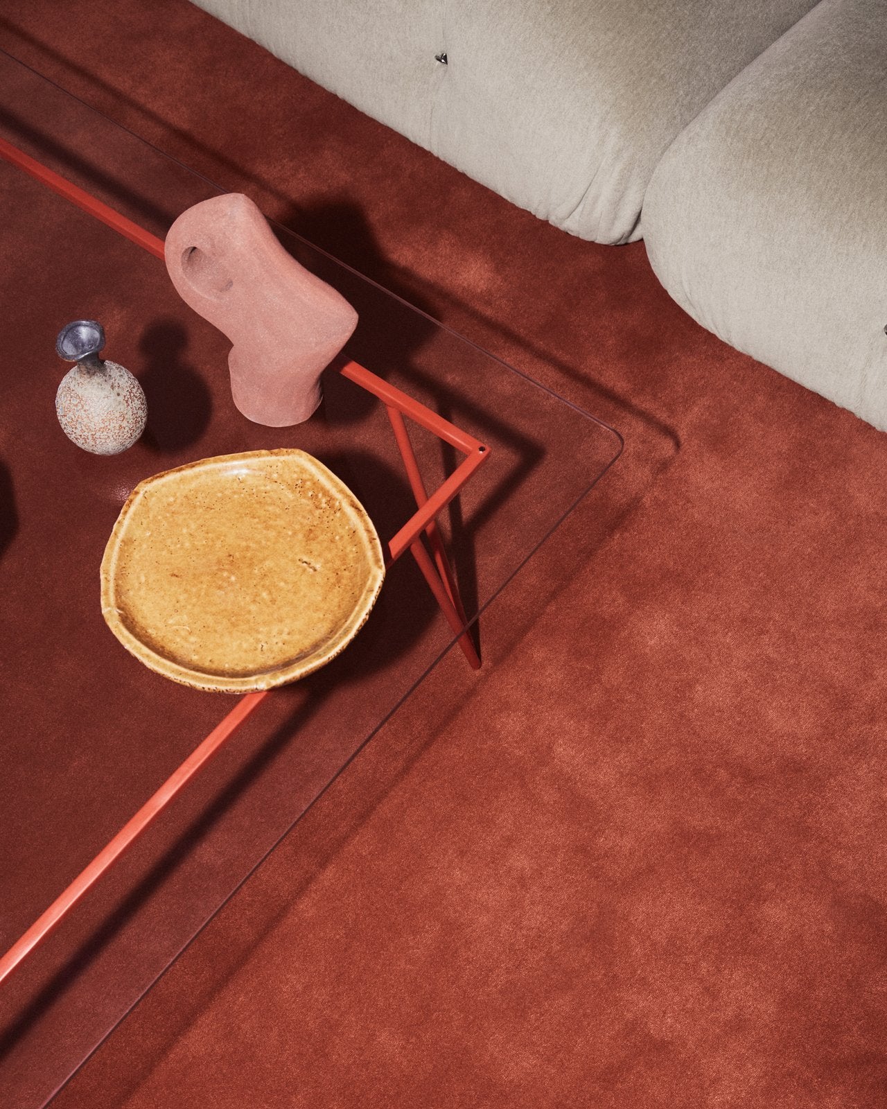 coral hand-tufted wool rug in living area