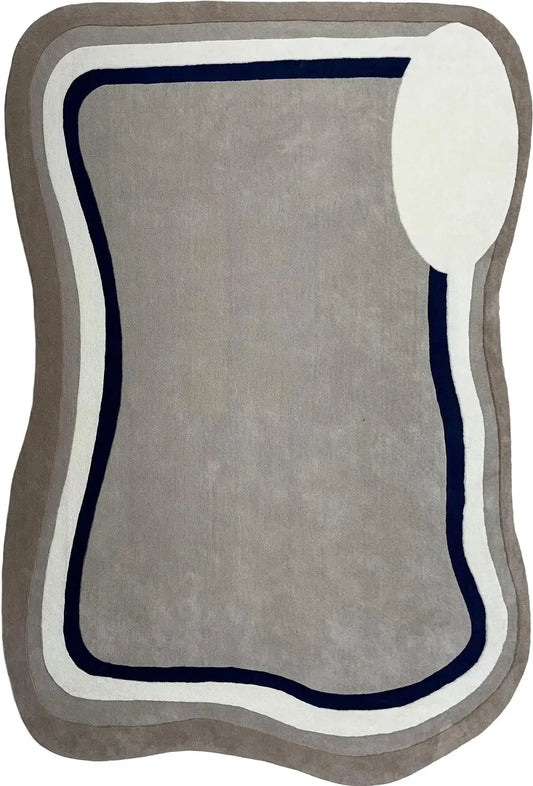 Gray hand tufted wool rug with a white border and a blue accent line