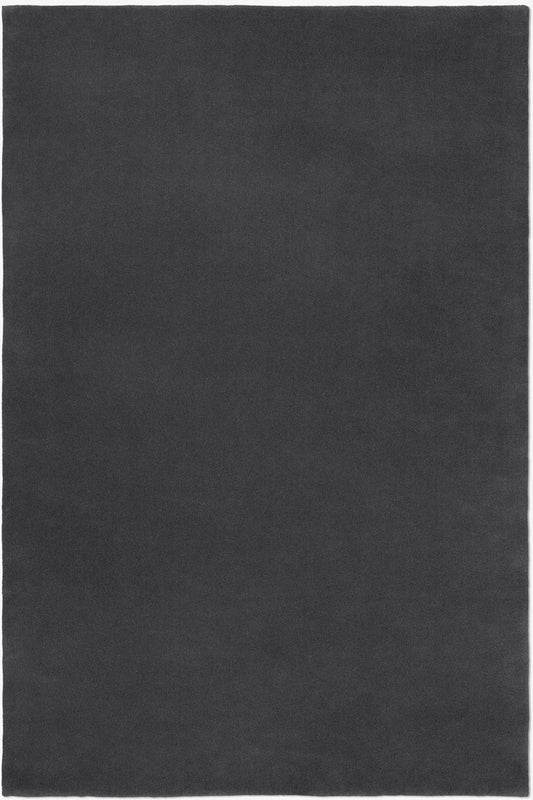 hand-tufted wool rug in rich black