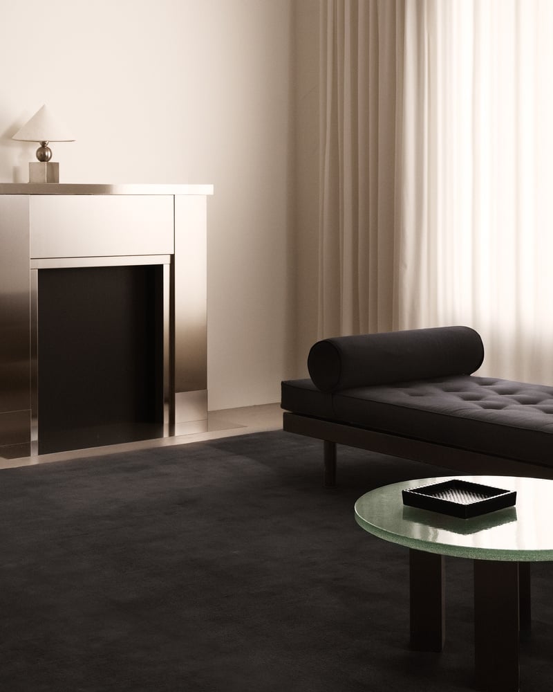 living room with rich black hand-tufted wool rug