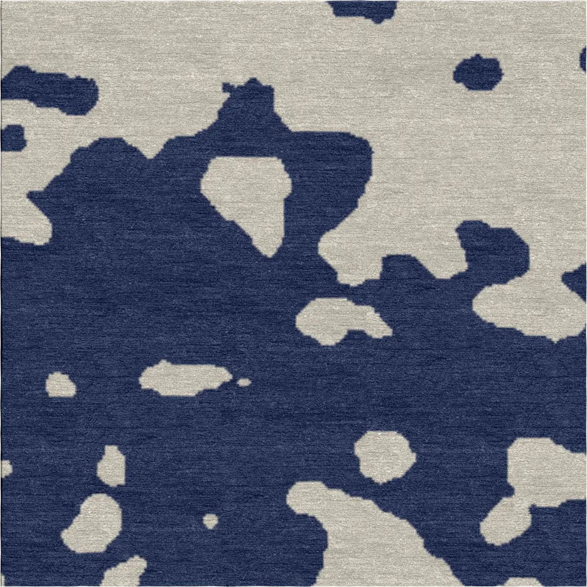 close view of joyee wool area rug with camouflage pattern with blue and gray colors