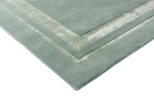 grey tufted wool rug corner