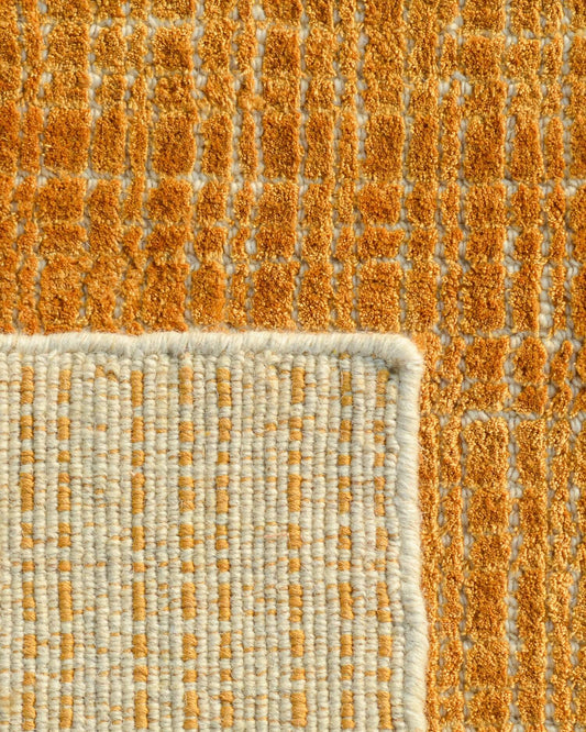 loom and hand tufted wool rug