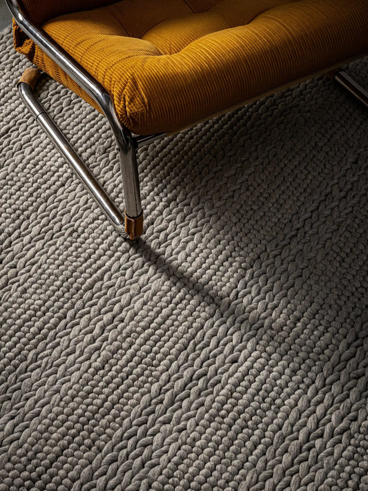 hand woven wool rug with chair