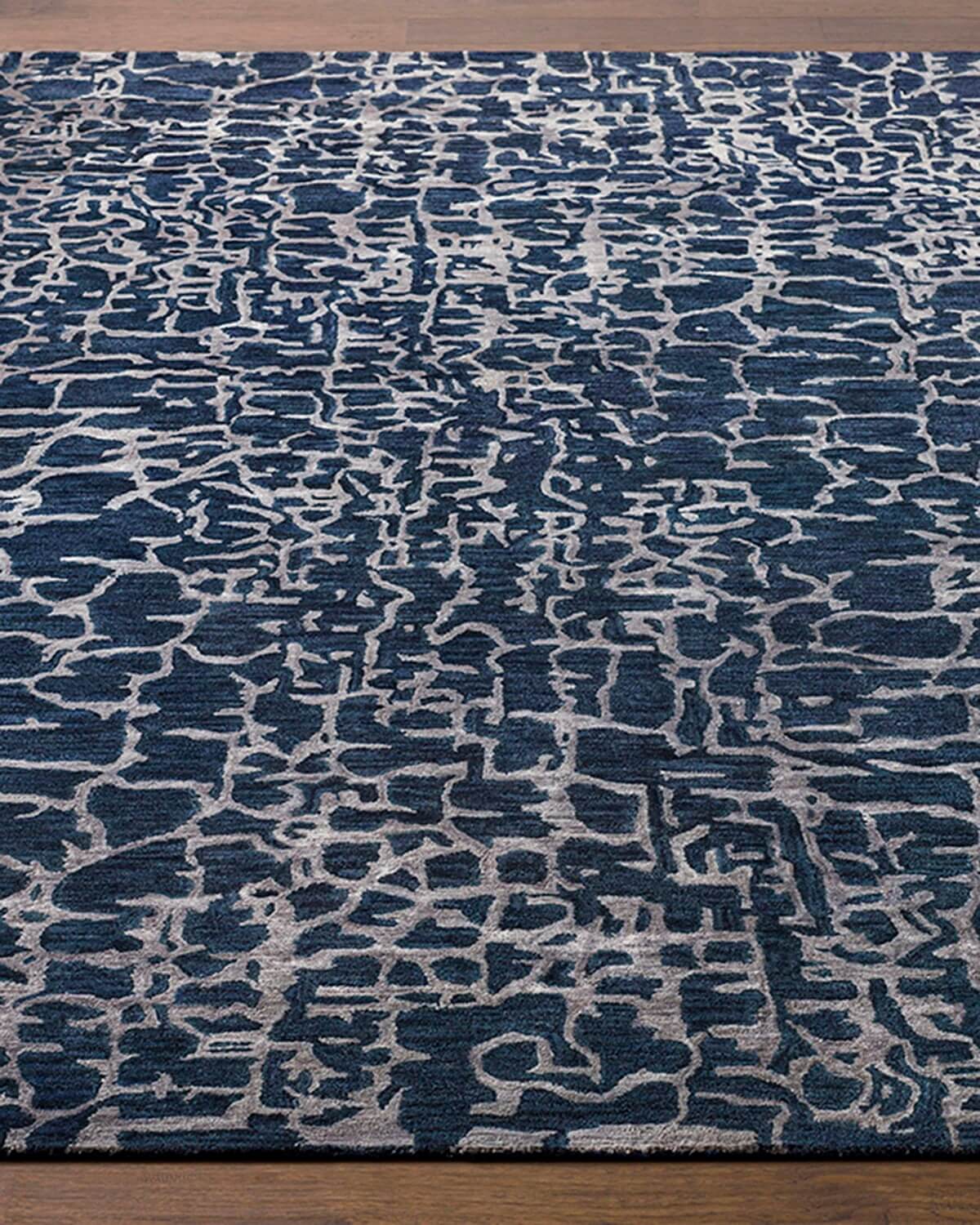 side view of grey line design wool rug