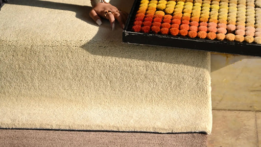 handmade wool rug and colour pomps