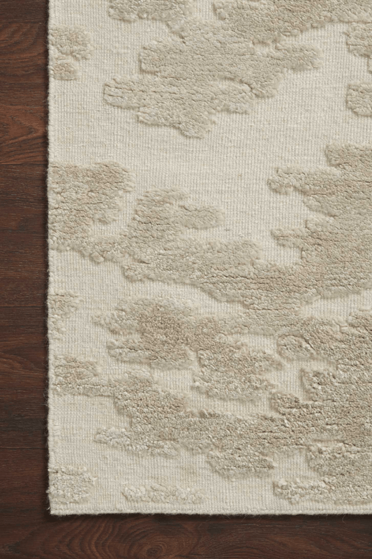 Close-up of hand-knotted wool rug, showing corner details