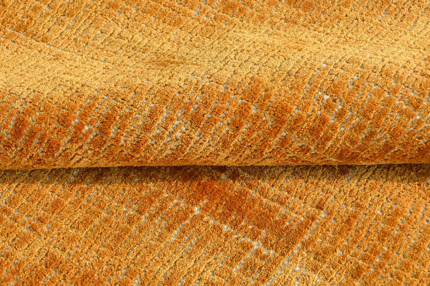 amber wool rug close up