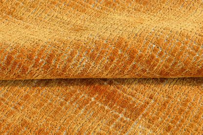 amber wool rug close up
