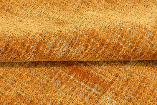 amber wool rug close up