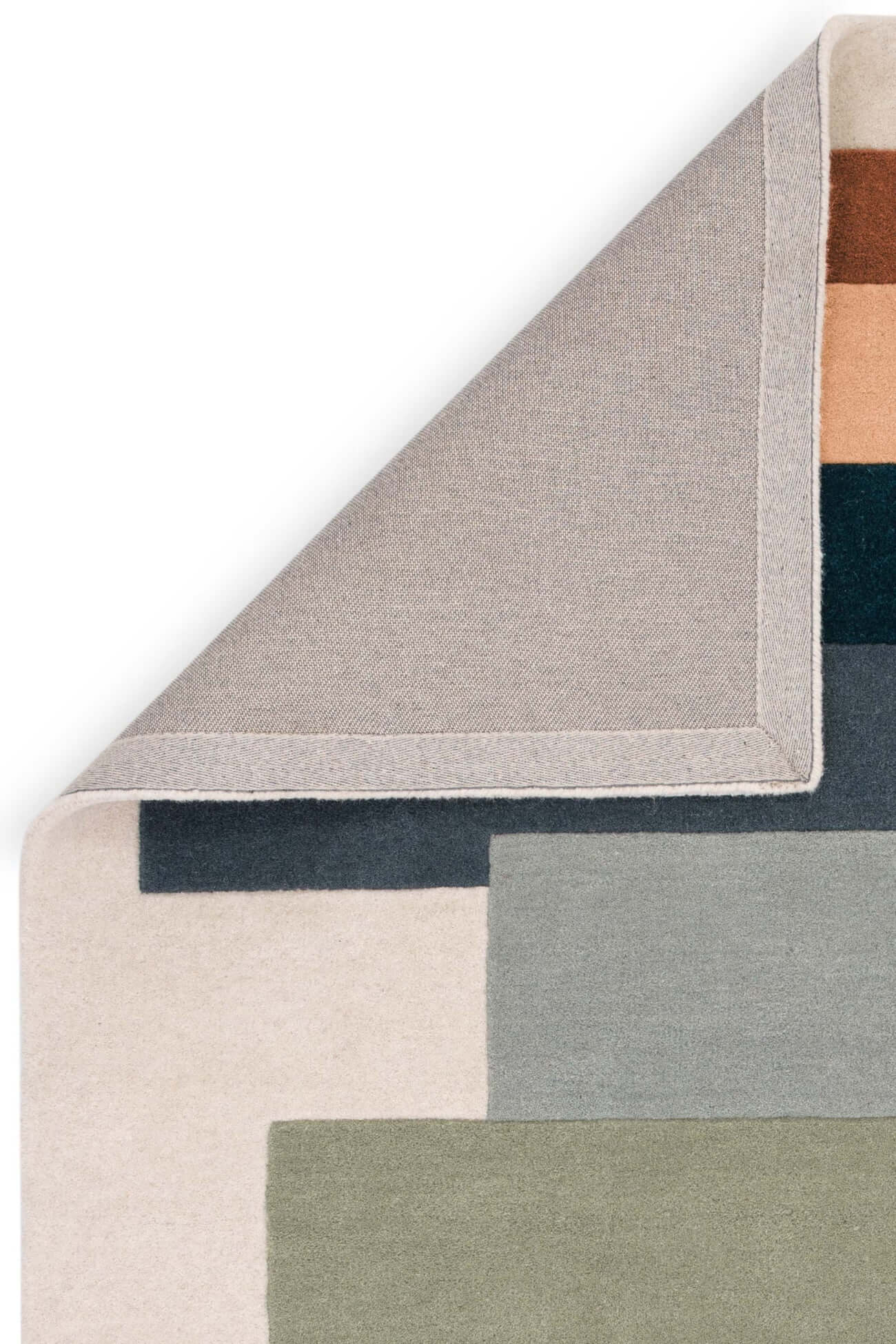 Close-up of a modern hand tufted wool rugs with rectangular shape design
