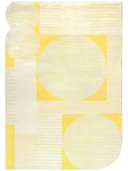 a hand knotted wool rug in yellow