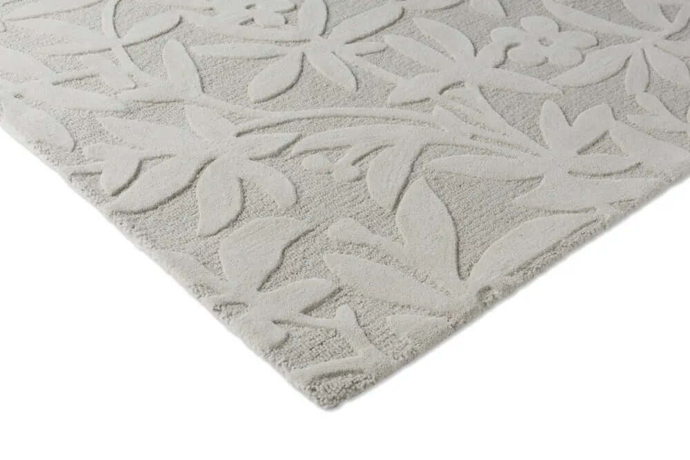 grey tufted wool rug corner