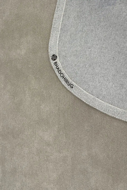 Bhadohirug's gray hand tufted rug made with nz wool