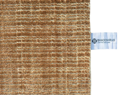 Textured brown rug by Bhadohirug