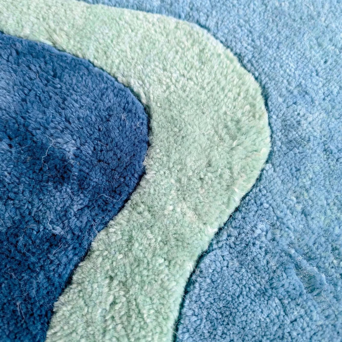 Novii Hand Tufted Wool Shaped Rug