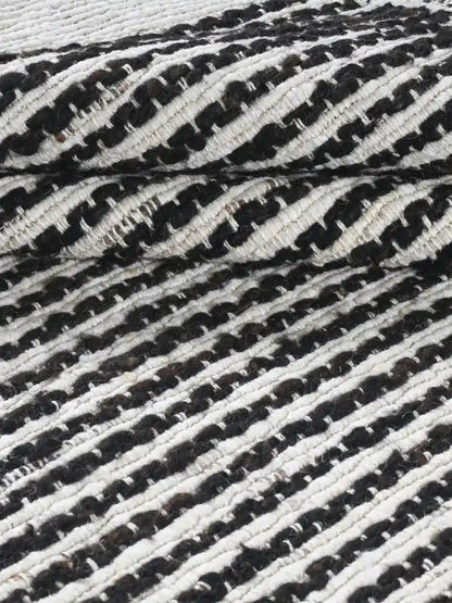 black and white stiped woven jute rug