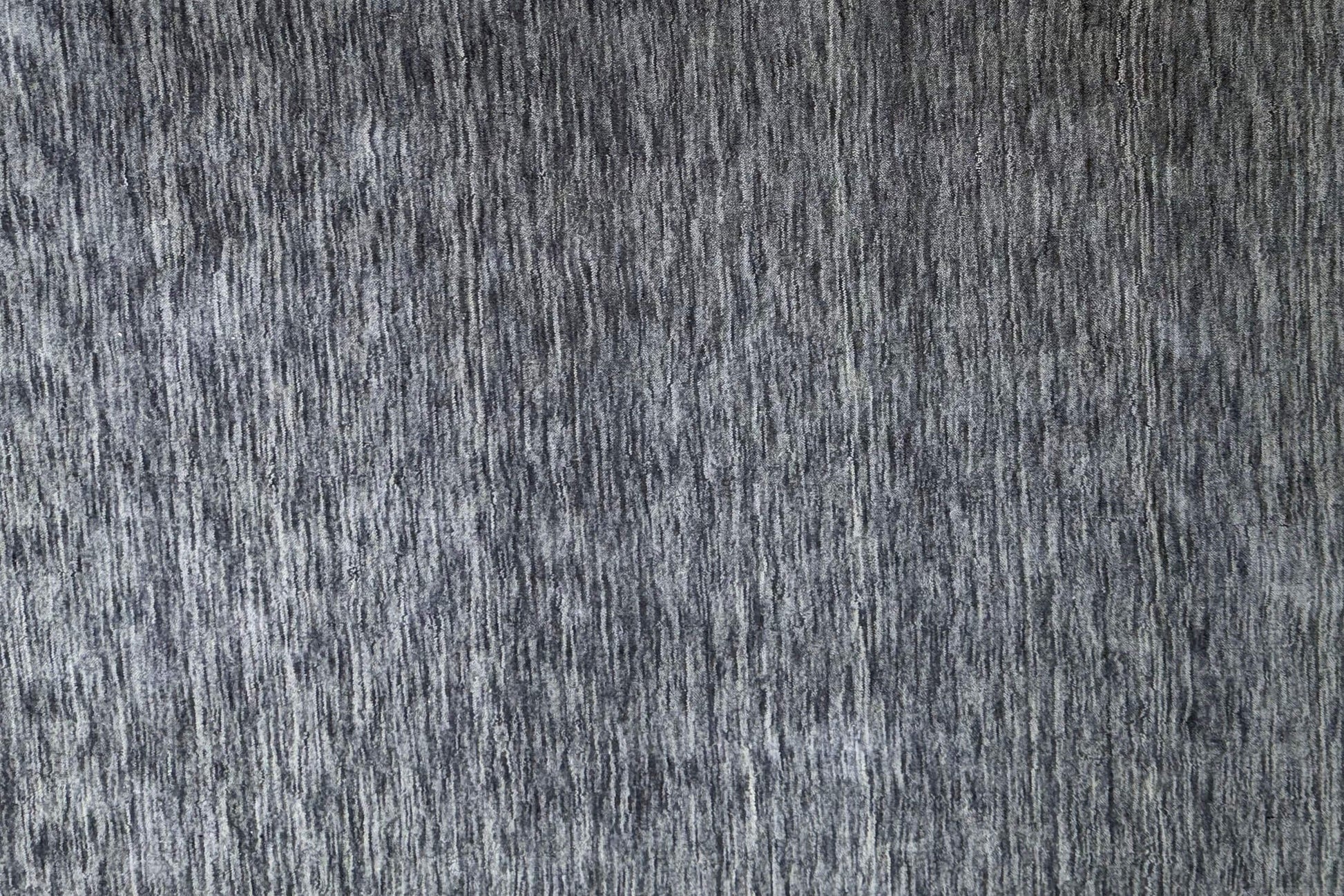 grey handloom area rug close up