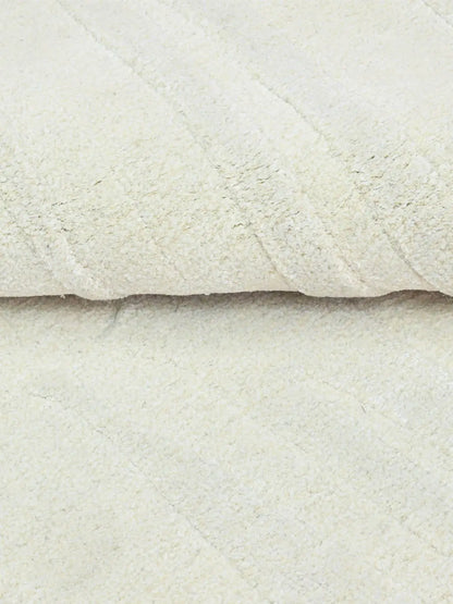 tufted wool and silk rug close up