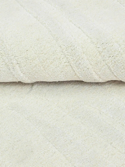 tufted wool and silk rug close up