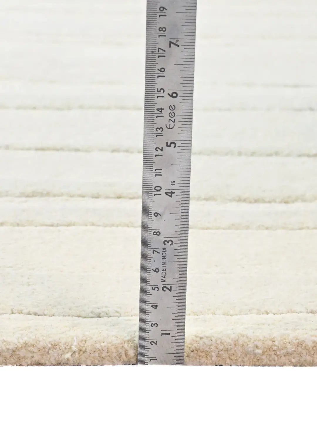 pile height of white wool rug