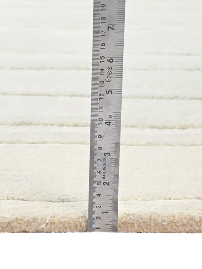 pile height of white wool rug