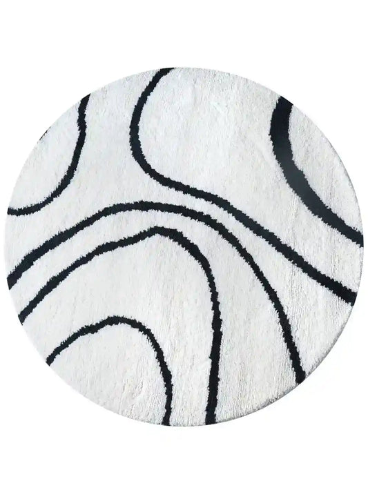 hand knotted black and white round wool rug